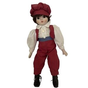 Collectible Vintage Porcelain Boy Doll, matching red Cap, vest and pants 15 in